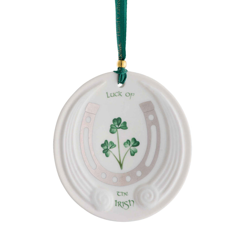 Belleek Luck Of The Irish Ornament - An oval decorative ornament with shamrock design, horseshoe and  and text reading Luck of the Irish