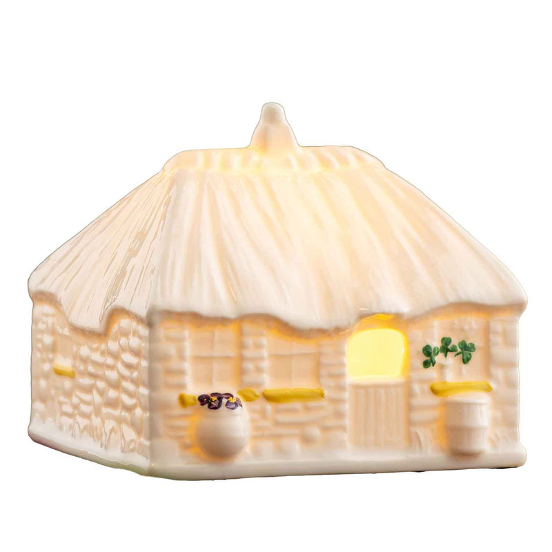 Belleek 2025 LED Irish Thatched Cottage A Cottage-shaped night light with handpainted flowers and shamrock detail