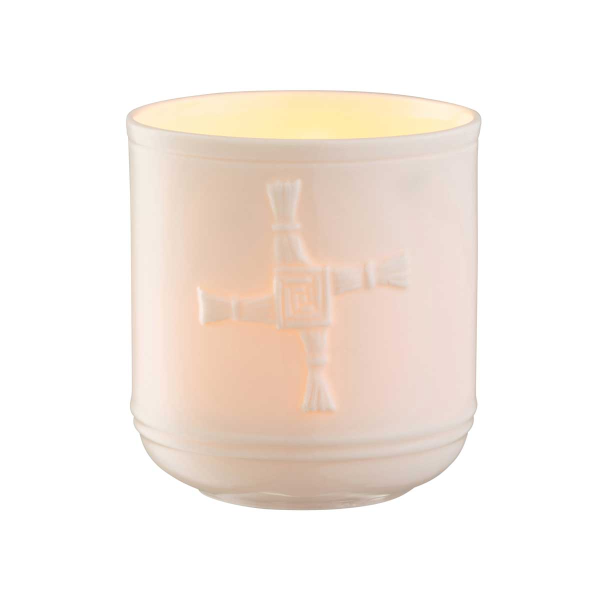 belleek pottery st. bridget's cross irish votive jar lit with a candle inside
