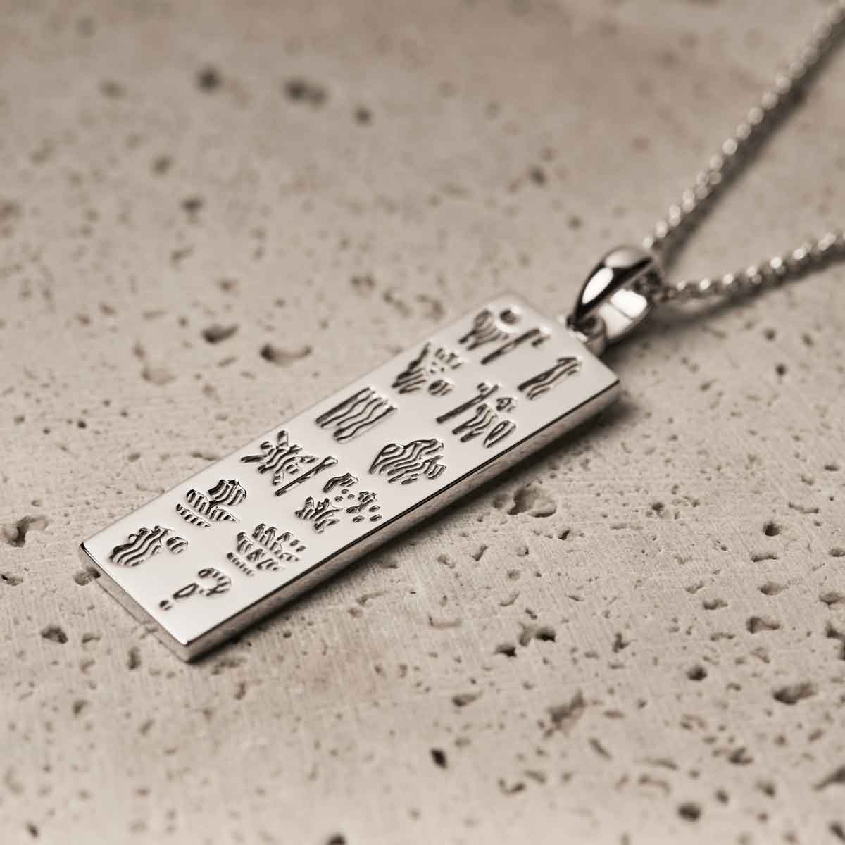 sterling silver history of ireland ingot on a textured surface