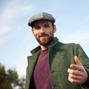 Man wearing Donegal Tweed Cap & Jacket