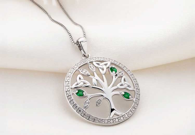 14k White Gold Celtic Tree of Life Pendant and chain with Emeralds on a white background