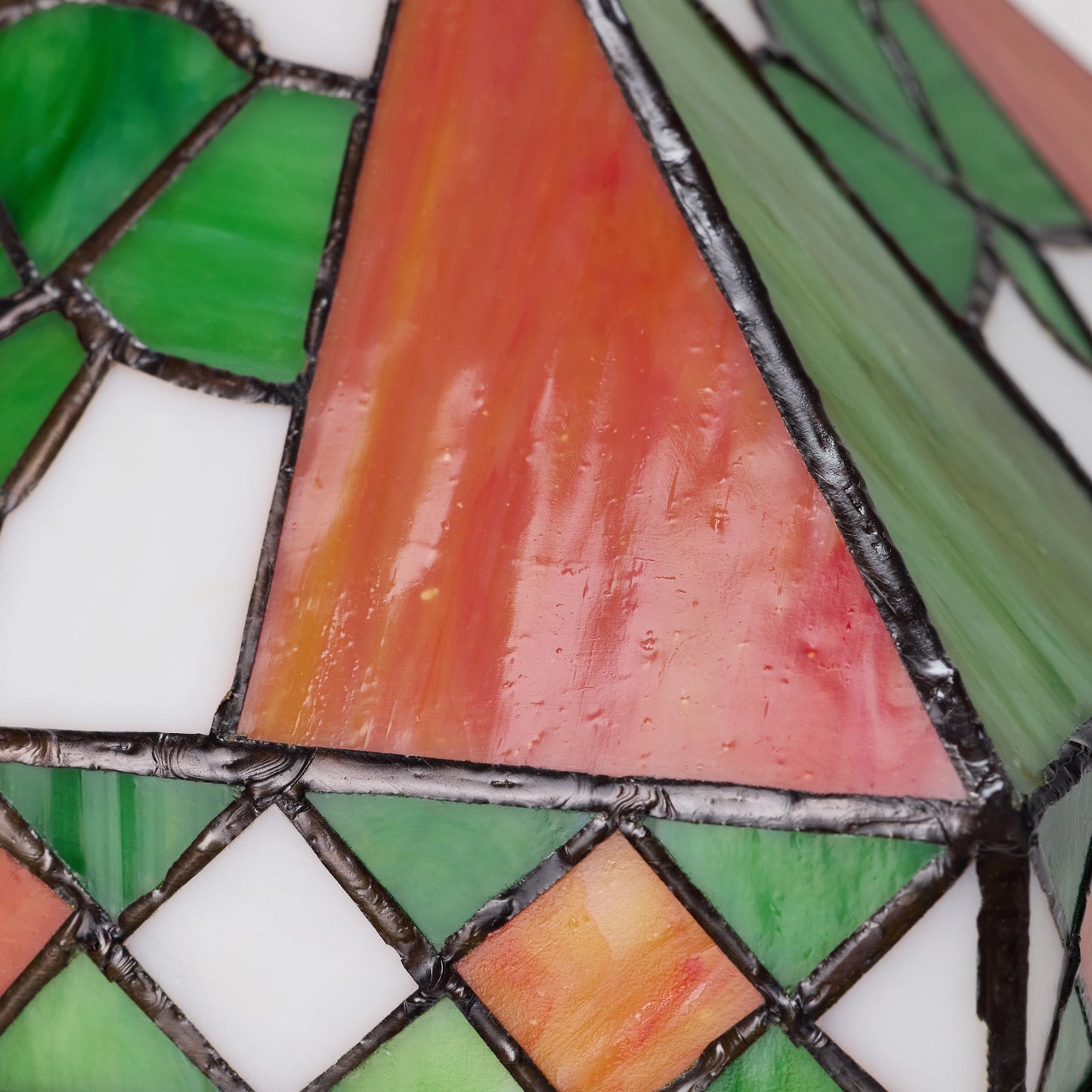 close-up detail of st. patrick's day irish flag tricolor stained glass table lamp