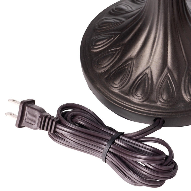 Decorative light fixture with a coiled brown power cord on a white background