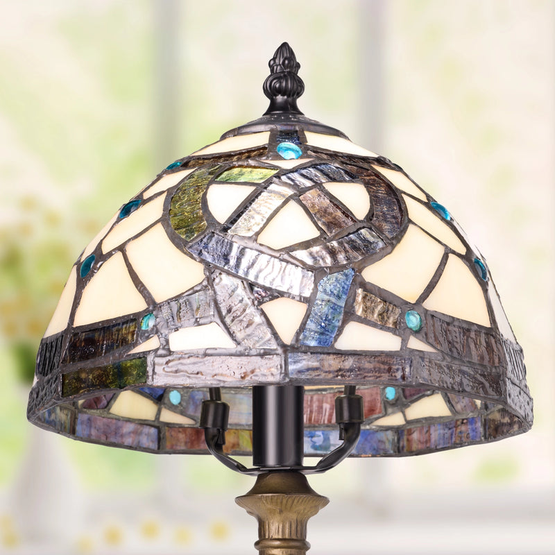 Celtic Stained Glass Amber Pathway Table Lamp on a blurred background