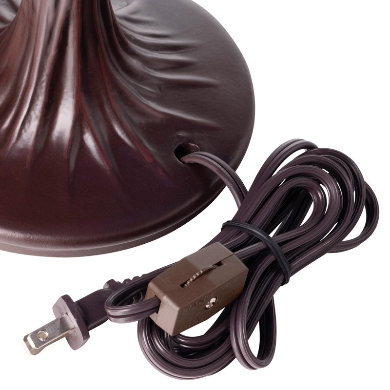 Brown lampshade with power cord on a white background