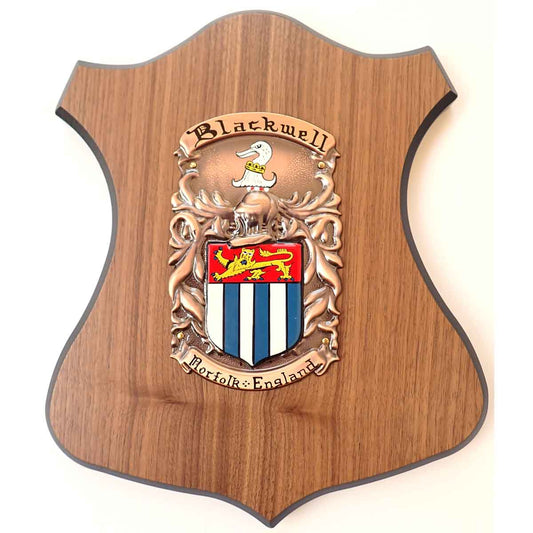 Coat of Arms | Hand Painted Plaque Medium : A painted family crest and motto for the name Blackwell, mounted on a wooden shield base, on a white background