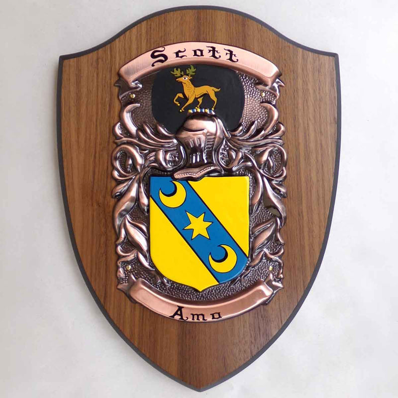Coat of Arms | Hand Painted Plaque Large: A painted family crest and motto for the name Scott, mounted on a wooden shield base, on a white background