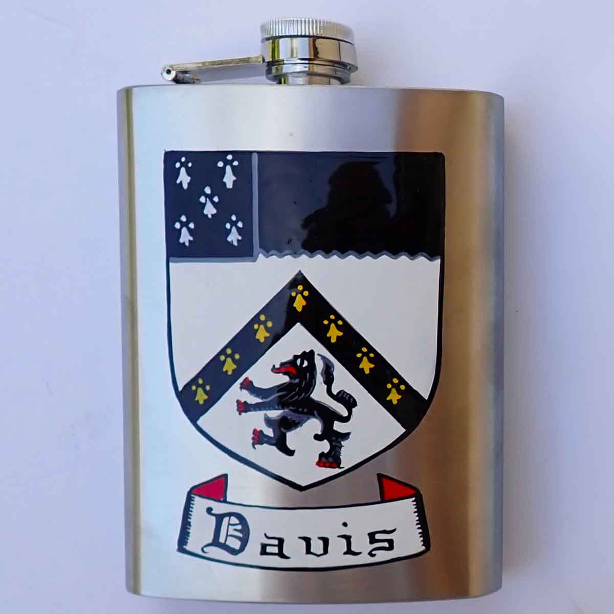 a stainless steel hip flask hand painted with the davis coat of arms