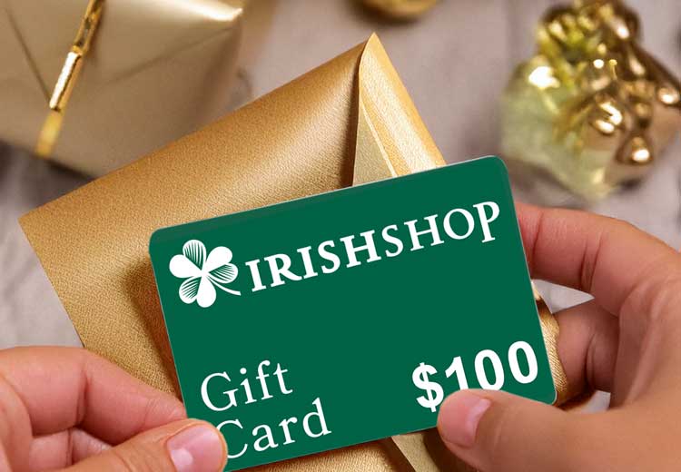 A closeup of someone unwrapping an IrishShop Gift Card