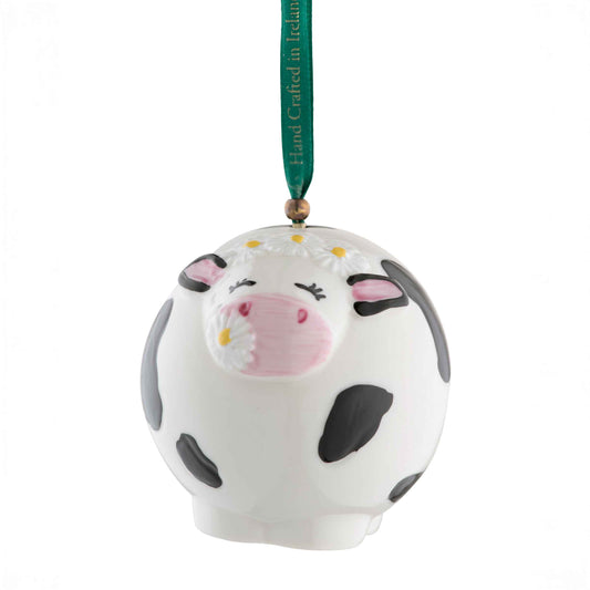Belleek Daisy the Cow Ornament - A white cow-shaped hanging ornament with black spots 
