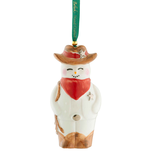Belleek Wild West Snowman Ornament - A Christmas ornament shaped like a snowman wearing a cowboy hat and red neckerchief on a white background.