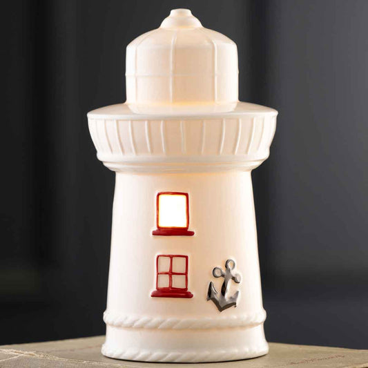 Belleek Pottery Edition Piece 2026 LED Irish Lighthouse with a small light inside on a dark background