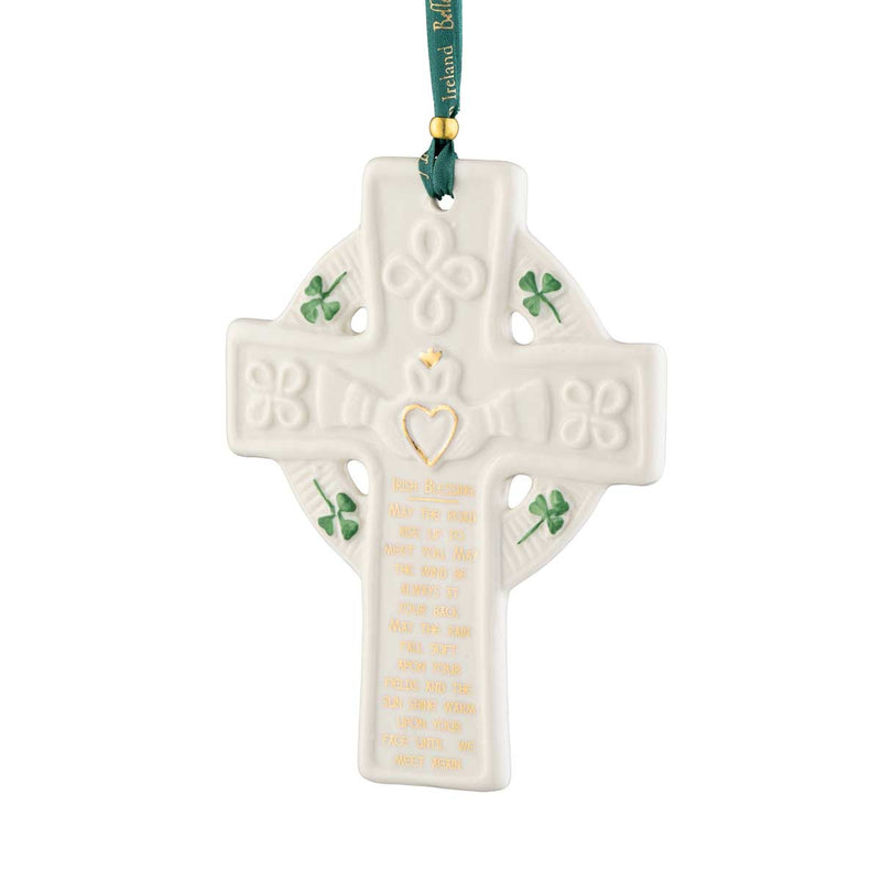 Irish Christmas Belleek Pottery Claddagh Blessing Cross Ornament hanging from a green ribbon on a white background