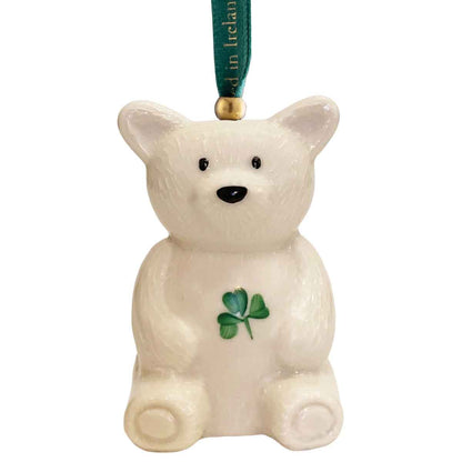 Belleek Pottery Teddy Bear Hanging Ornament with green ribbon on white background