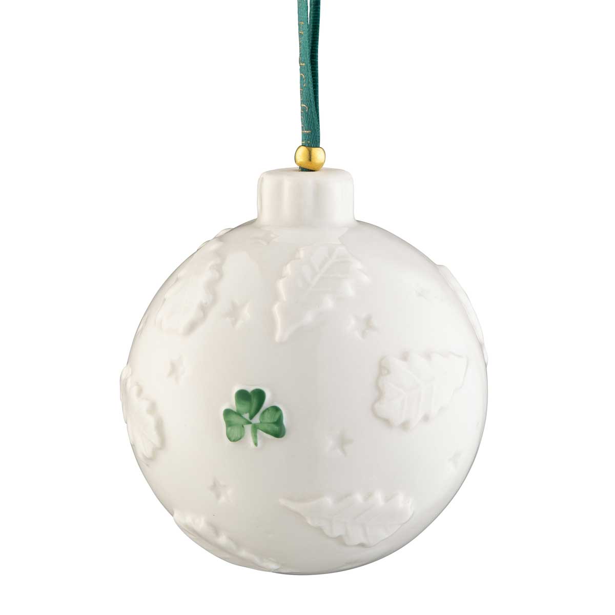 reverse side of the belleek pottery celtic tree of life bauble with a hand painted green shamrock hanging from a green ribbon on a white background 