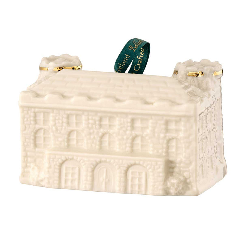 Reverse view of the Kilkenny Castle Belleek Pottery Annual Irish Christmas Ornament 2026 with a green ribbon on a white background.
