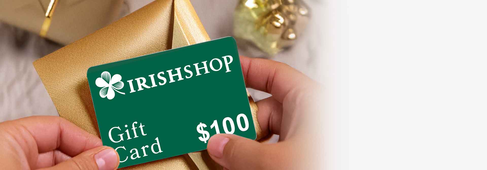 A closeup of someone unwrapping an IrishShop Gift Card