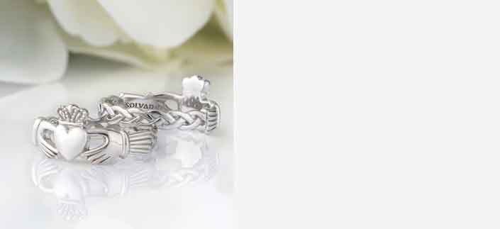 Two Irish Sterling Silver Celtic Weave Claddagh Rings on a white background