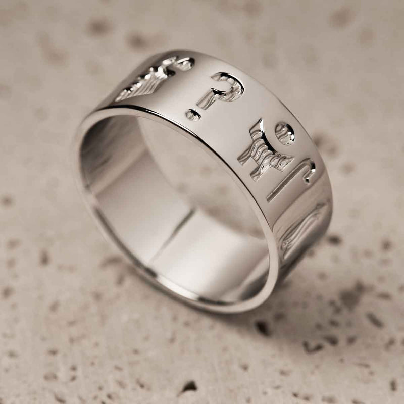 Sterling Silver History of Ireland Ring on a textured beige background