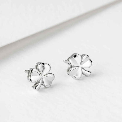 Sterling Silver Shiny Stud Shamrock Earrings on a light gray background
