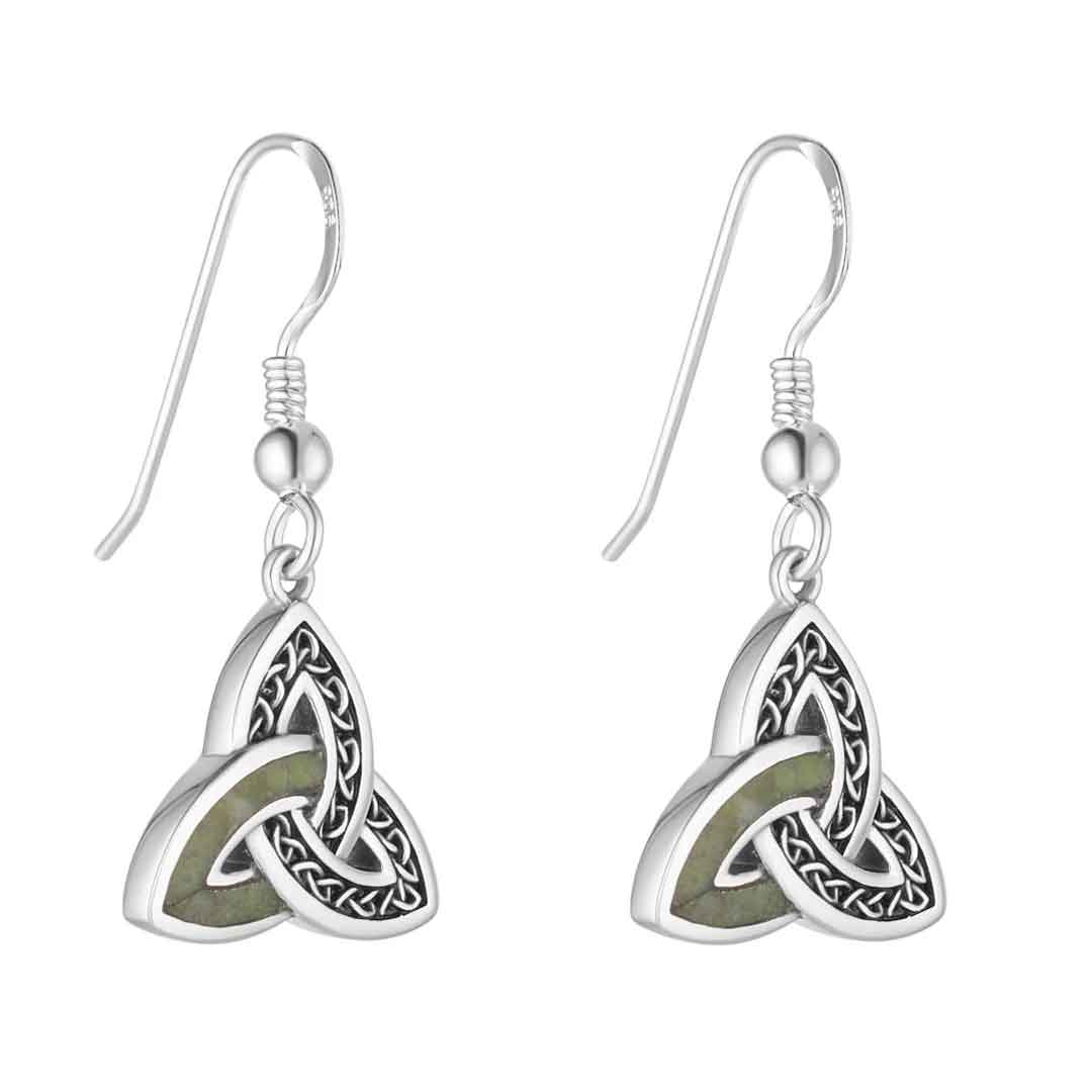 a pair of sterling silver connemara marble accent celtic trinity knot earrings on a white background