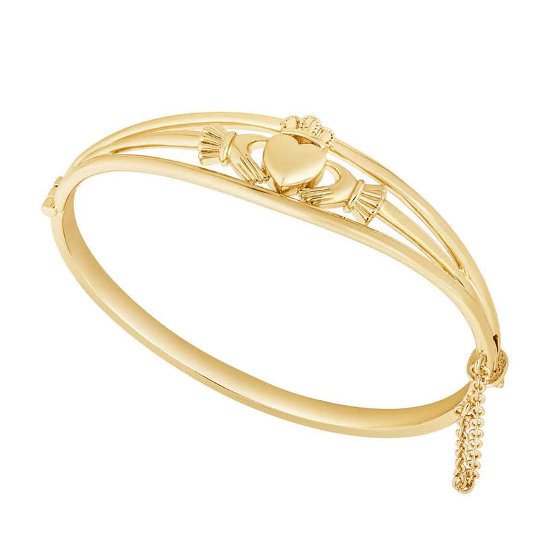 Gold Plated Claddagh Bangle on a white background