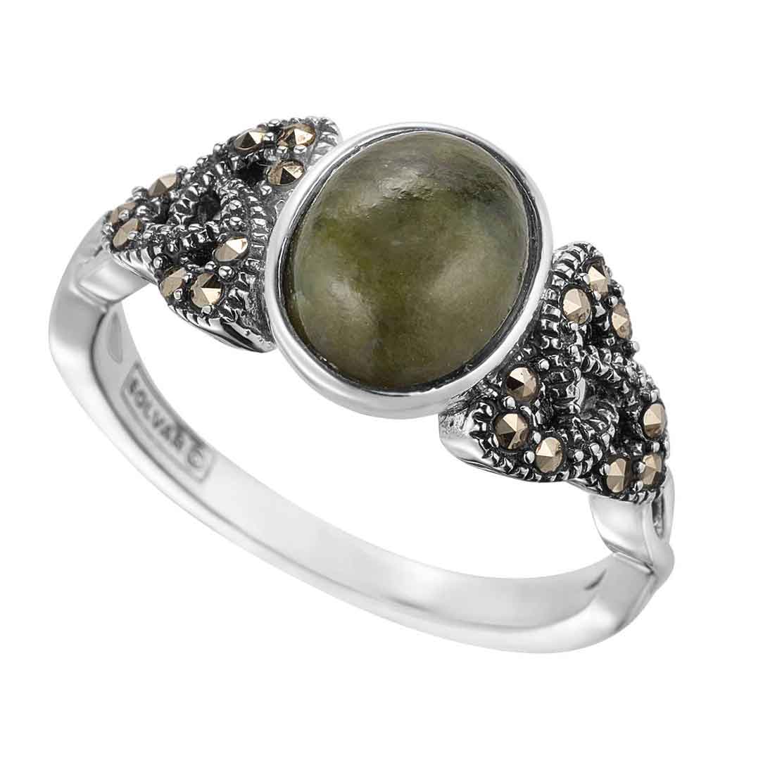 ladies sterling silver marcasite trinity knot ring on a white background